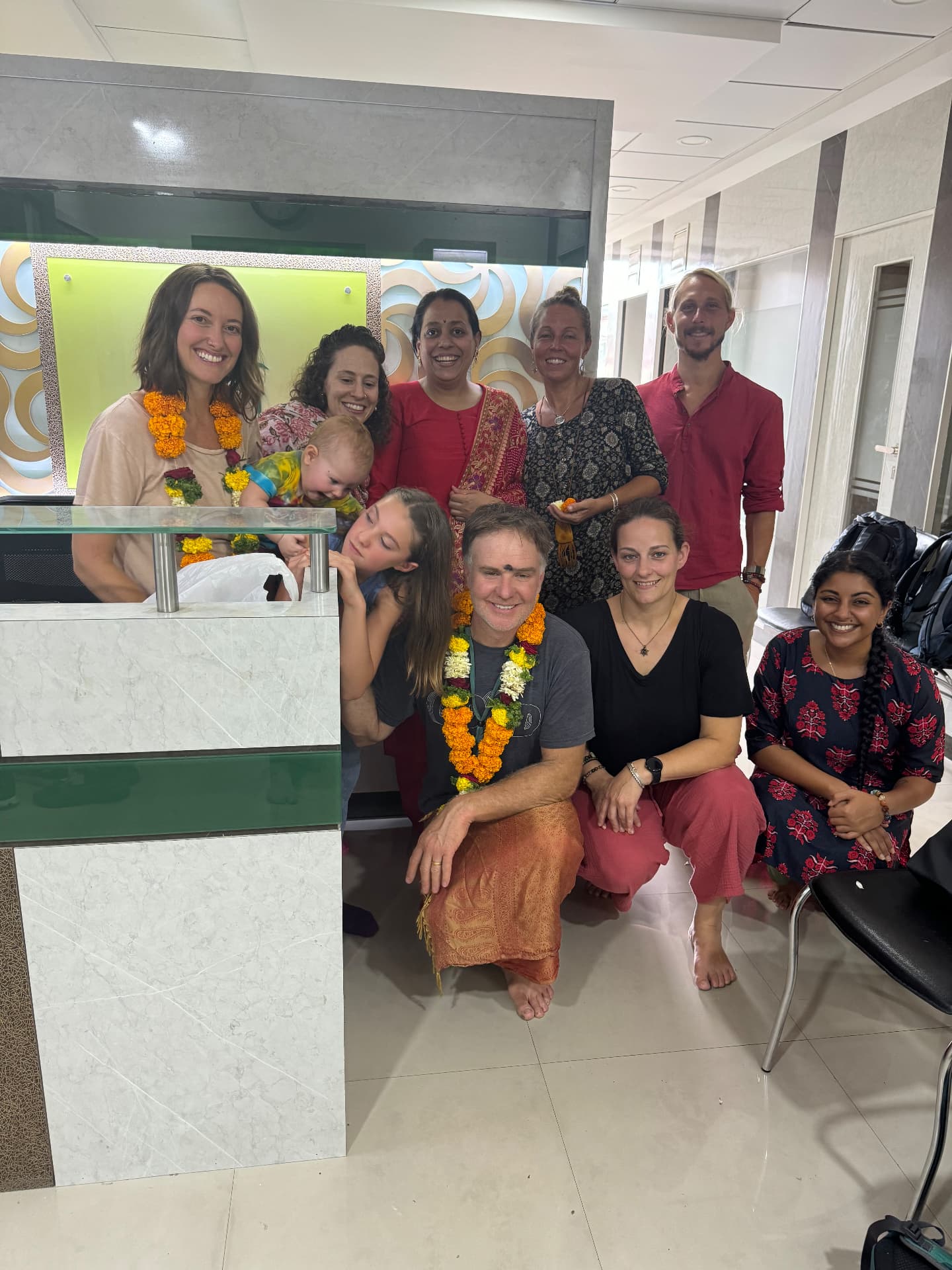 The group garlanded on arrival at the Ayurvedic clinic