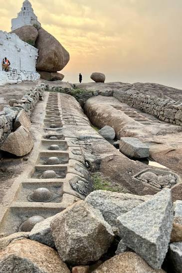 Carved stone steps on the boulder hills of Hampi